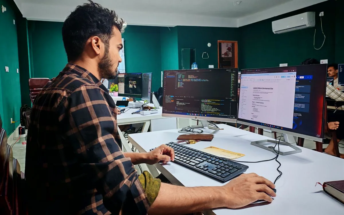 A software developer at work in an office